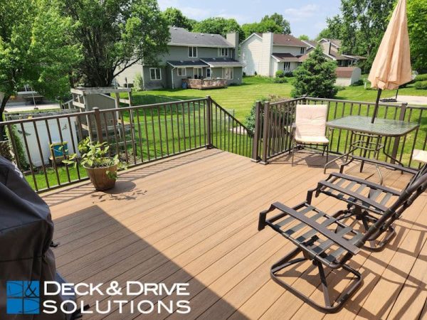 backyard view with chairs on new timbertech deck