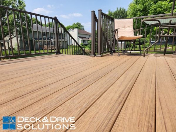 Close up of Timbertech Antique Leather Composite Decking with Metal Railing