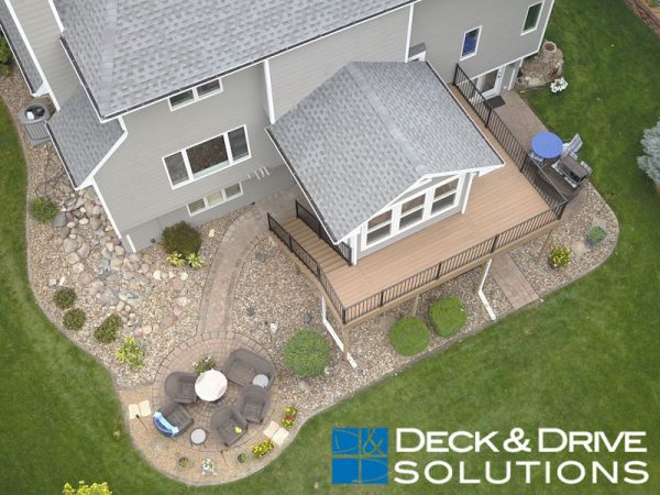 Drone overview of composite deck on 3 sides of a sunroom