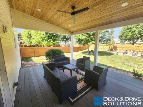 outdoor furniture on new covered composite deck with cedar ceiling and Timbertech flooring