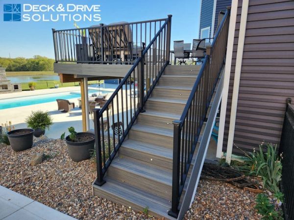 trex deck stairs with riser lights and metal railing post cap lights