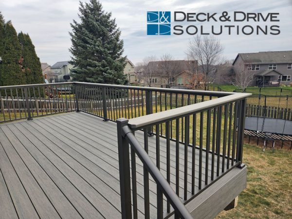 drink rail on top of deck by stair railing